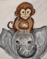 Brown monkey sitting on the head of a gray elephant