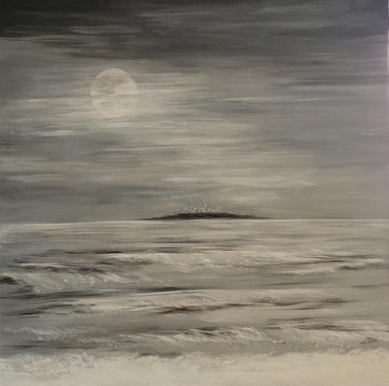 Distant island in a moonlit sea.