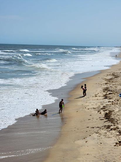People playing on beach